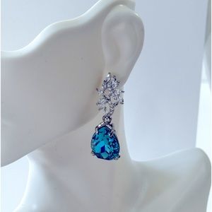 Blue topaz color cubic zircon Earrings , available in clip earrings as well